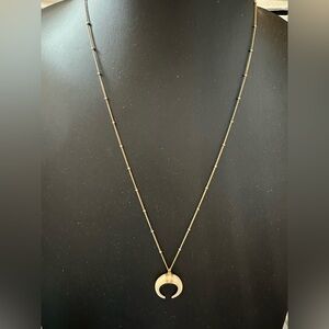 Ivory colored bone double horn pendant on gold filled satelite chain